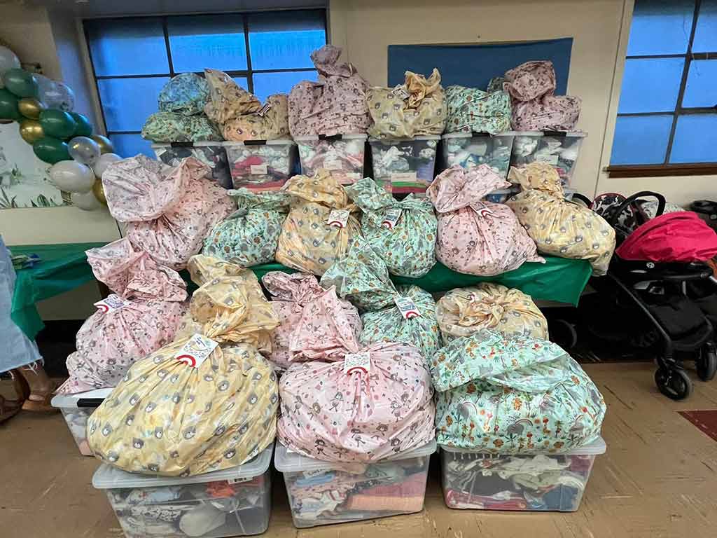 Bags of essentials for babies of refugee mothers